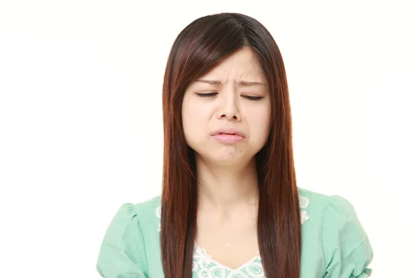 Sorgliga unga japansk kvinna — Stockfoto