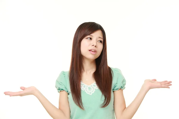 Young Japanese woman confused — Stock Photo, Image