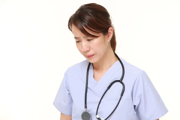 Japanese female doctor depressed — Stock Photo, Image