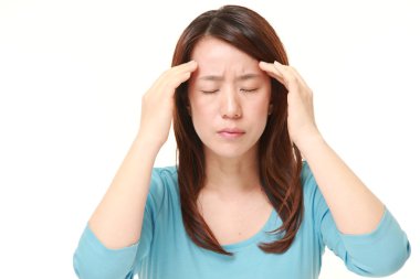 woman suffers from headache clipart