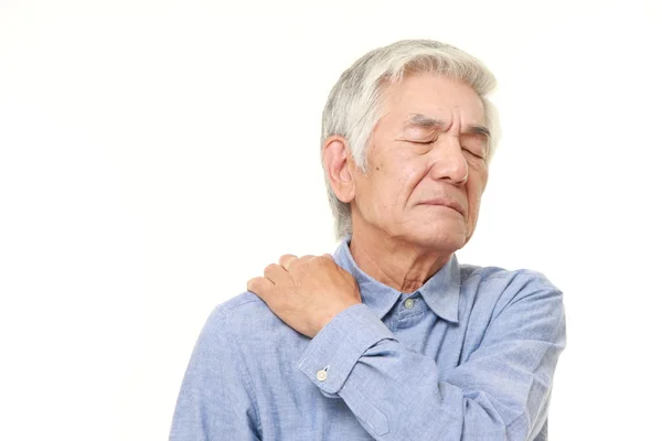 Senior Japanese man suffers from neck ache — Stock Photo, Image