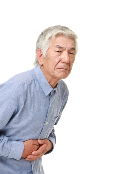 Homme japonais âgé souffre de maux d'estomac — Photo