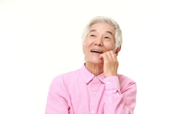 Senior japonais homme pense à quelque chose — Photo