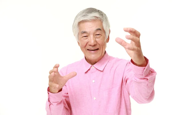 Senior Japanese man with supernatural power — Stock Photo, Image