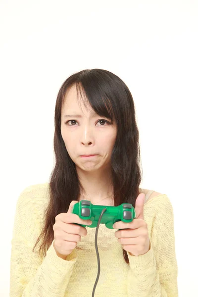 Молодих Японські жінки втрати гра відео гра — стокове фото
