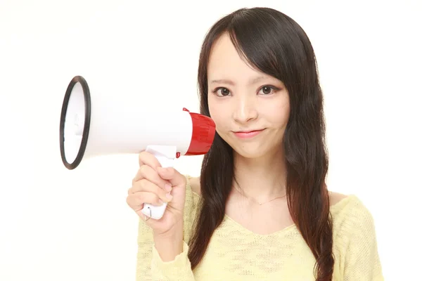 Jovem mulher japonesa com megafone — Fotografia de Stock