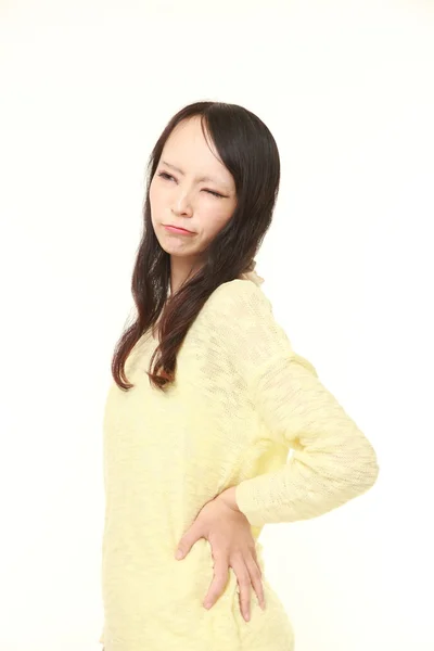 Japanse vrouw lijdt aan lumbago — Stockfoto