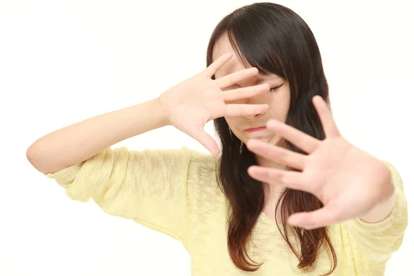 Junge Japanerin macht Stop-Geste — Stockfoto
