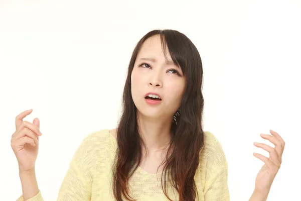 Perplexo jovem japonês mulher — Fotografia de Stock