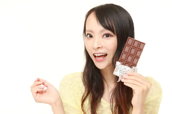 Japanese woman with chocolate — Stock Photo, Image