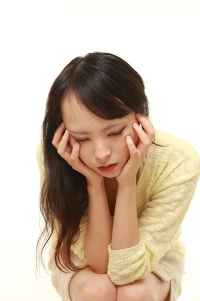 Depressed young Japanese woman — Stock Photo, Image