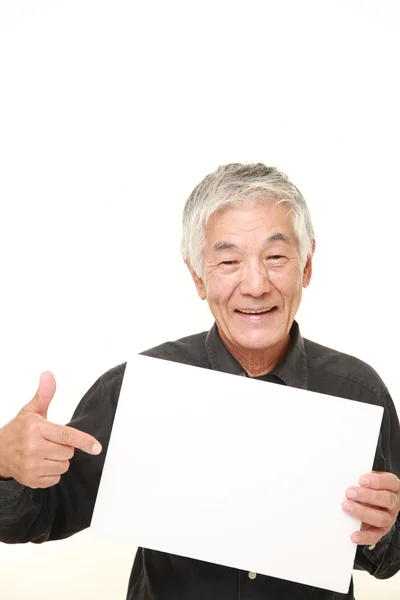 Senior japonés hombre con tablero de mensajes —  Fotos de Stock