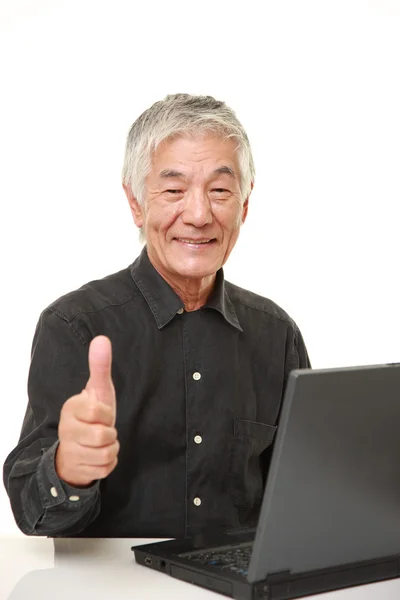 Senior Japanese  man using laptop computer — Stock Photo, Image