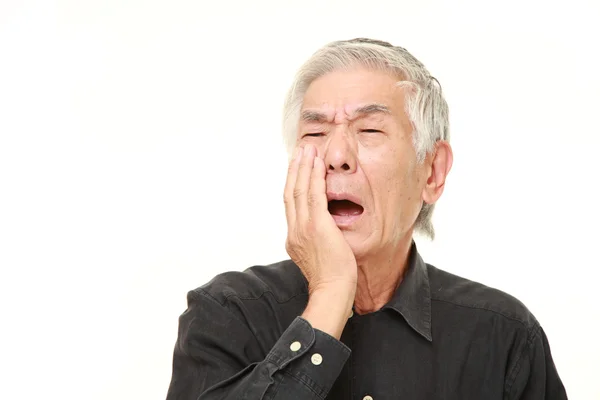 Sênior japonês homem sofre de dor de dente — Fotografia de Stock