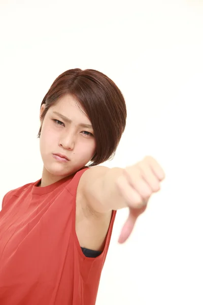 ジェスチャを親指で日本の若い女性 — ストック写真