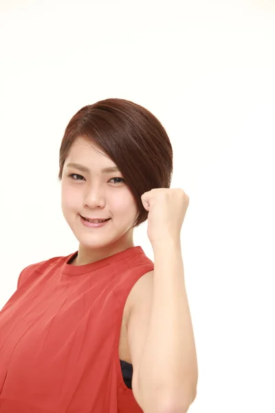 Young Japanese woman in a victory pose — Stock Photo, Image