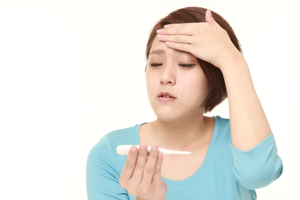 Young woman with fever — Stock Photo, Image