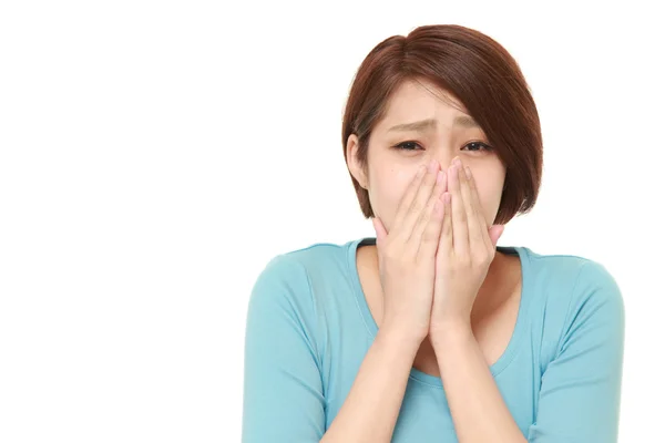 Young Japanese woman shocked — Stock Photo, Image