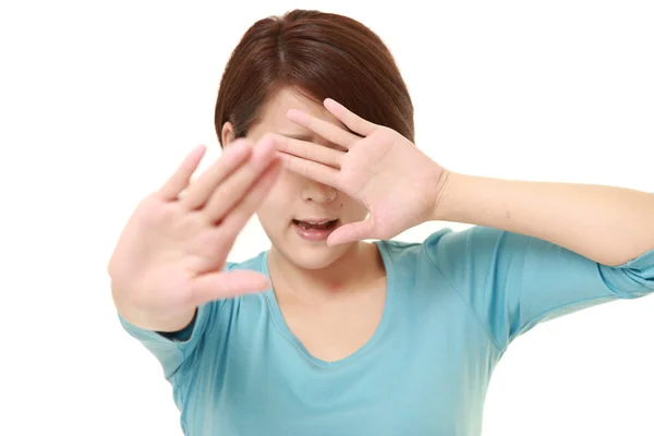 Young Japanese woman making stop gesture — Stock Photo, Image