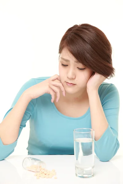 Young Japanese woman suffers from melancholy — Stock Photo, Image