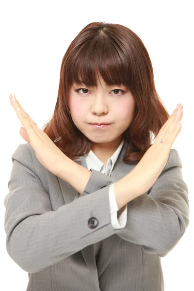 Japonesa mujer de negocios mostrando NO gesto — Foto de Stock