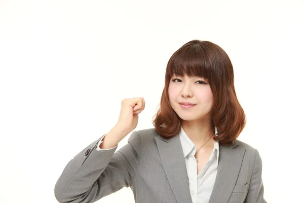 Jeune femme d'affaires japonaise dans une pose de victoire — Photo