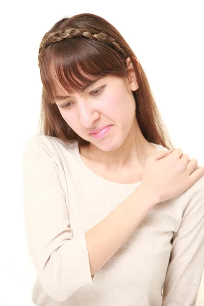 Young woman suffers from neck ache — Stock Photo, Image