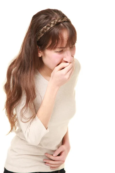 Mujer joven tiene ganas de vomitar — Foto de Stock