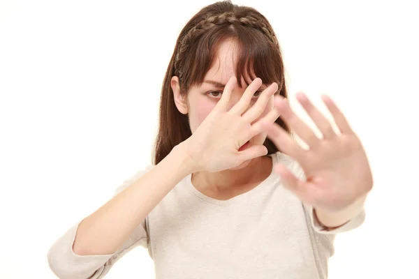 Young woman making stop gesture — Stock Photo, Image