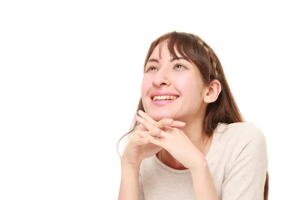 Mujer joven soñando con su futuro — Foto de Stock