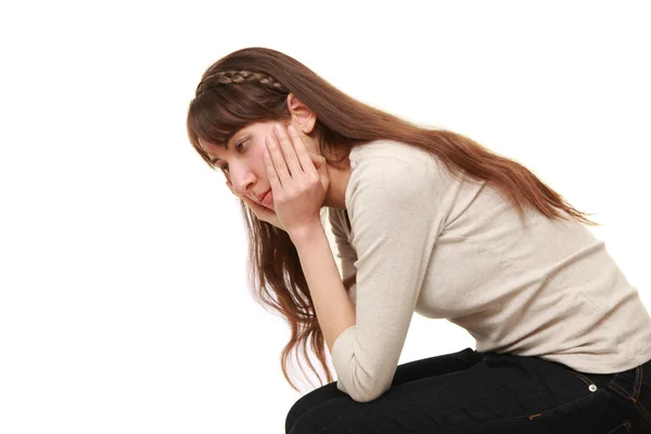 Depressed woman on white background — Stock Photo, Image