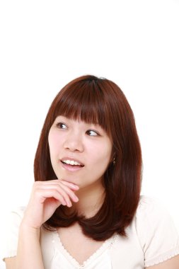 genç Japon kadın hakkında bir şeyler düşünüyor