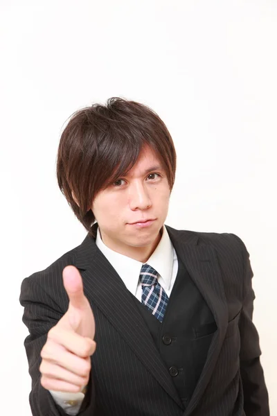 Japanese businessman with thumbs up gesture — Stock Photo, Image