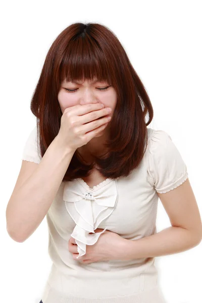 Japanese woman feels like vomiting — Stock Photo, Image