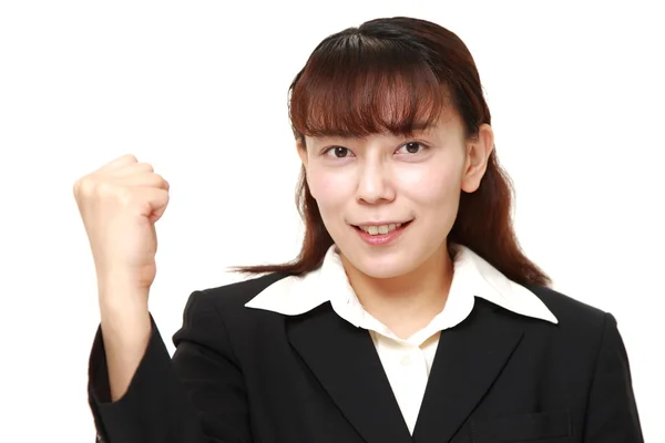 Unattractive Asian businesswoman in a victory pose — Stock Photo, Image