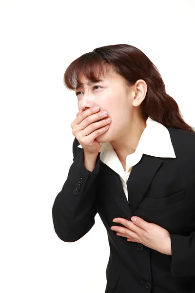 Asiática mujer de negocios se siente como vomitar —  Fotos de Stock