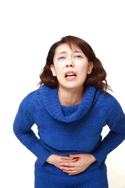 Asian woman suffers from stomachache — Stock Photo, Image