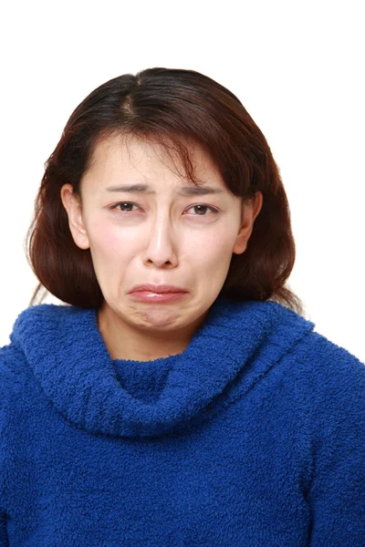 Femeie tristă pe fundal alb — Fotografie, imagine de stoc