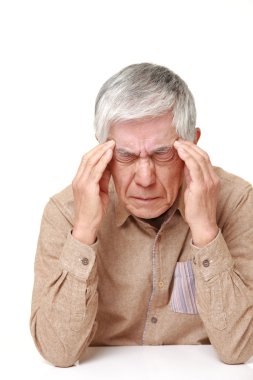 üst düzey Japon adam baş ağrısı muzdarip