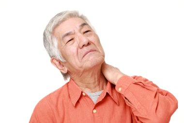 üst düzey Japon adam boyun ağrısı uğrar