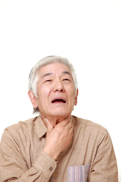 Senior Japanese man having throat pain — Stock Photo, Image
