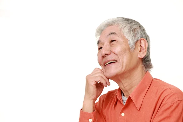 Senior Japanse man op zijn toekomst dromen — Stockfoto