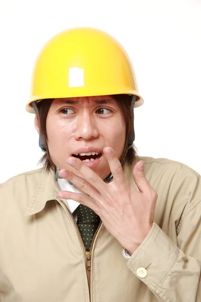 Unga japanska byggnadsarbetare chockad — Stockfoto
