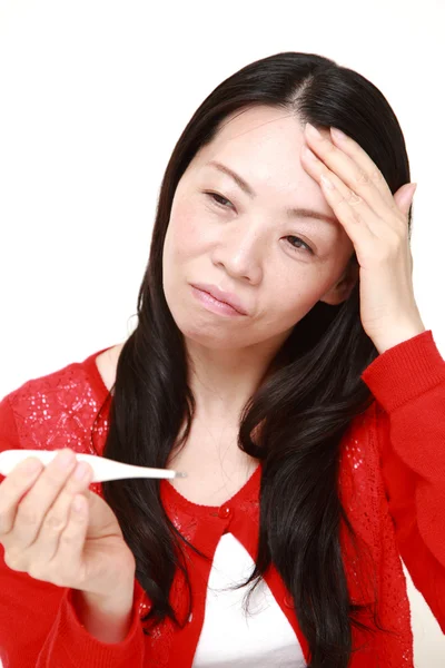 Japanese woman with fever — Stock Photo, Image