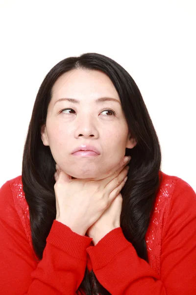 Japanese woman having throat pain — Stock Photo, Image