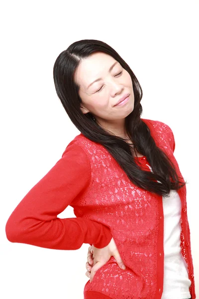 腰痛に苦しんでいる日本女性 — ストック写真
