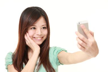 Japon kadın bir selfie alır