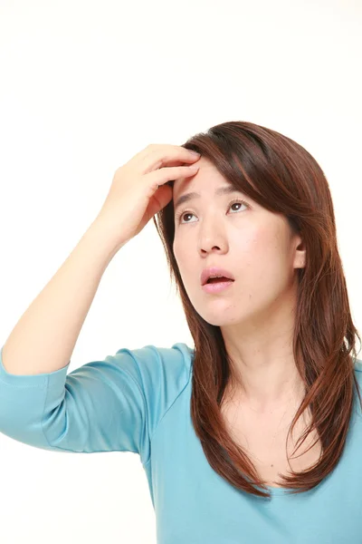 Middle aged Japanese woman has lost her memory — Stock Photo, Image