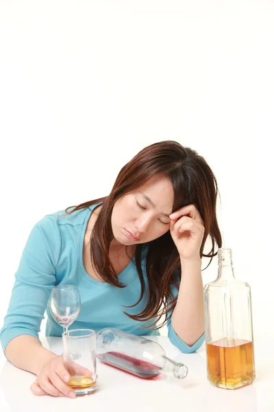 Middle aged Japanese woman in depression is drinking alcohol — Stock Photo, Image