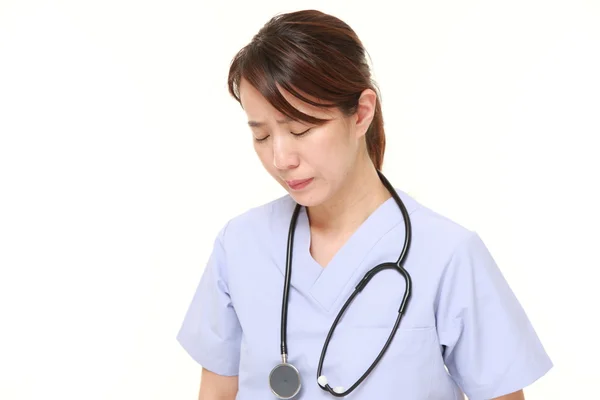 Japonesa mujer médico sufre —  Fotos de Stock